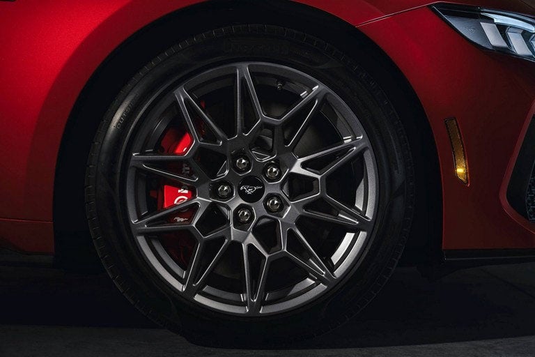2024 Ford Mustang® model with a close-up of a wheel and brake caliper | Pinnacle Ford in Nicholasville KY