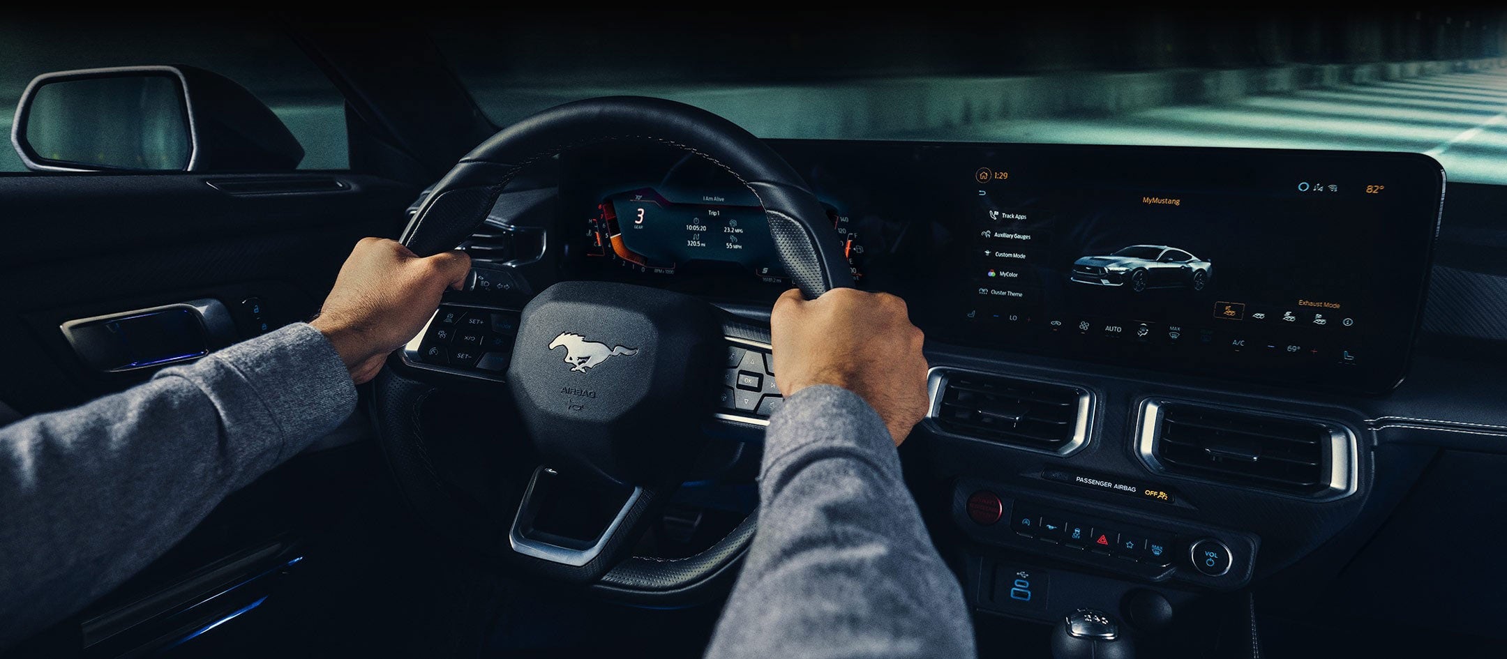 A 2024 Ford Mustang® model interior with a person driving | Pinnacle Ford in Nicholasville KY